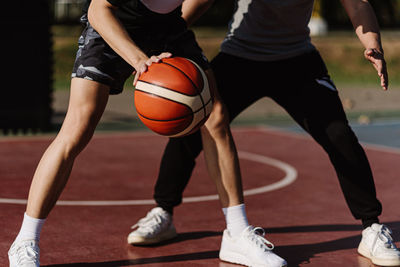 Low angle view of basketball at court