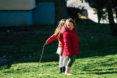 Portrait of a girl standing outdoors