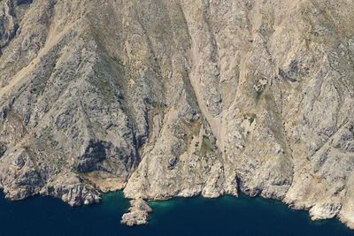 Aerial view of rock formation in sea