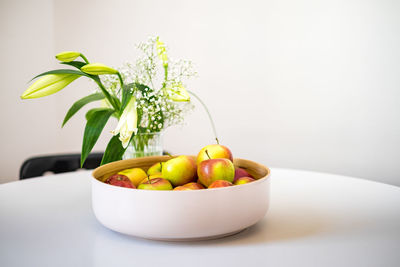 Close-up of fruits in bowl on table