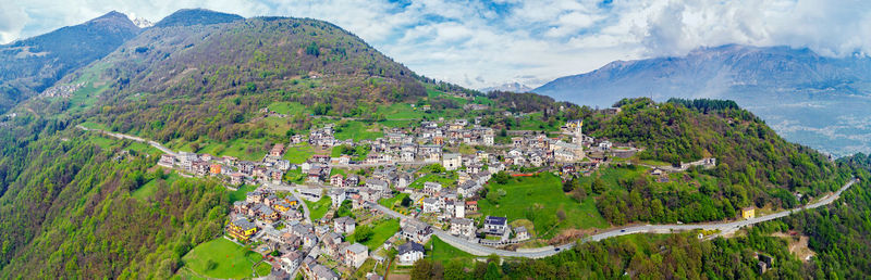 High angle view of townscape against mountains