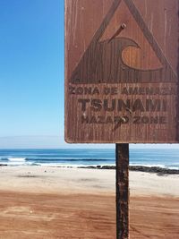 Scenic view of beach against clear sky