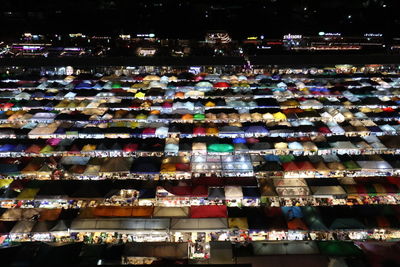 Aerial view of illuminated market at night