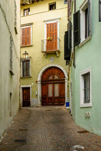 Alley amidst buildings in city