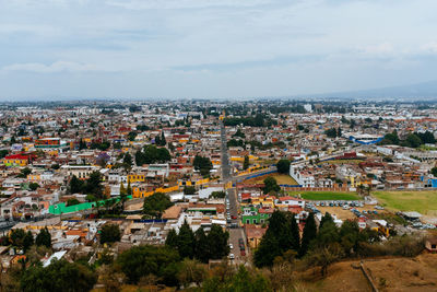 High angle shot of townscape against sky