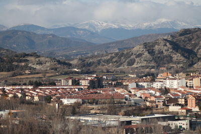 Aerial view of residential district and mountains