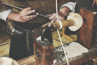 Man working on metal