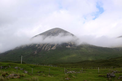 View of mountain against cloudy sky