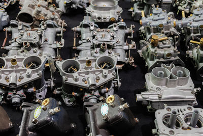 Group of steel car carburetor for sale - car spare part.