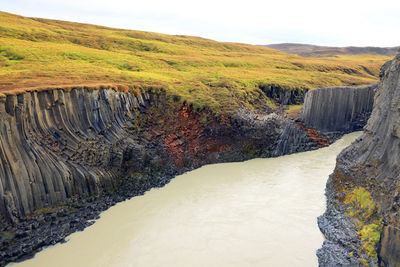 High angle view of river amidst rocks