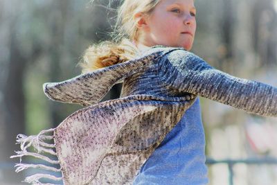 Close-up of girl on sunny day