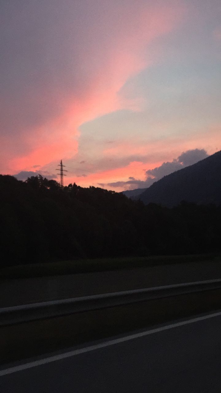 SILHOUETTE LANDSCAPE AGAINST SKY DURING SUNSET