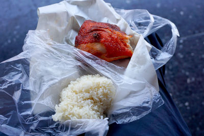 High angle view of strawberries in plastic