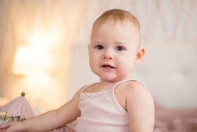 Portrait of cute baby at home