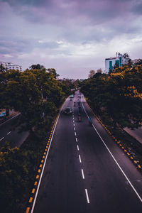 High angle view of vehicles on road against sky