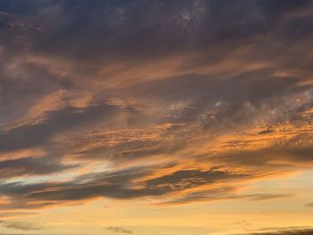 Low angle view of dramatic sky during sunset