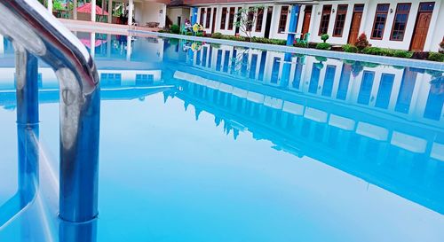 Reflection of building on swimming pool