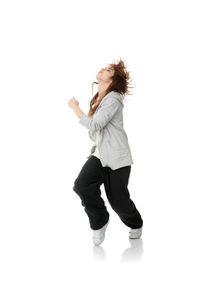 Side view of woman standing against white background