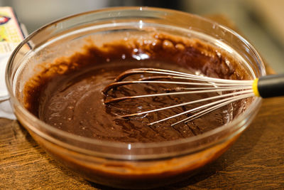 Close-up of ice cream in jar on table