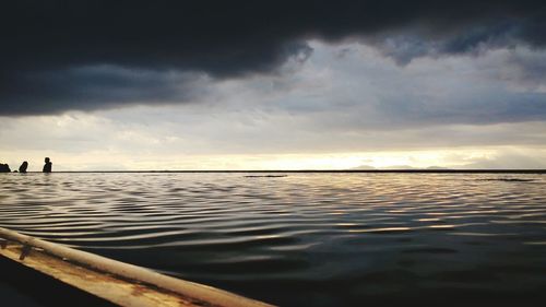 View of calm sea at sunset