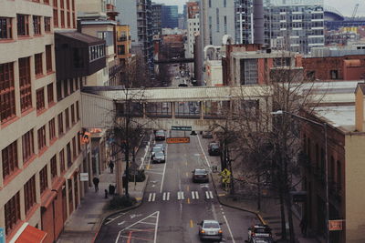 High angle view of street amidst buildings in city