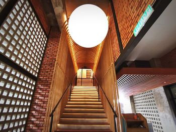 Low angle view of illuminated staircase in building