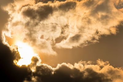 Low angle view of clouds in sky during sunset