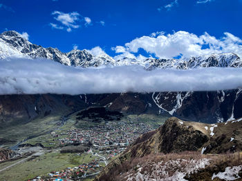 Scenic view of snowcapped mountains against sky