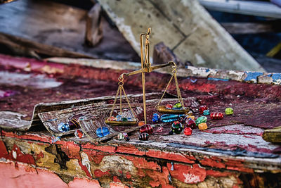 Close-up of cross on wood