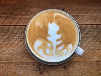 Directly above shot of cappuccino on table