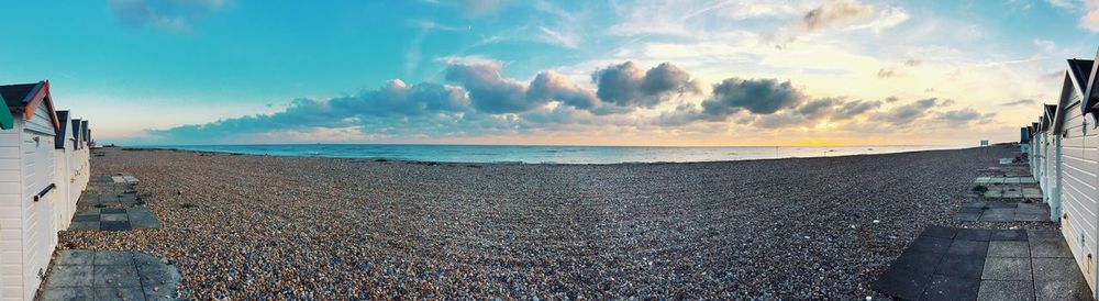 Panoramic view of sea against sky during sunset