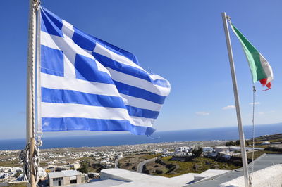 Close-up of flag against blue sky