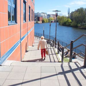 Woman walking on city street