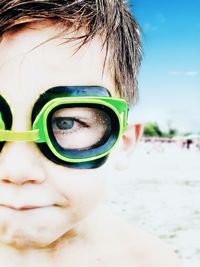 Close-up portrait of boy wearing sunglasses