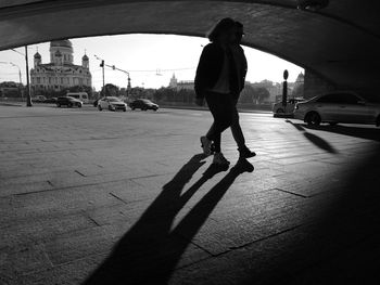 People walking on street in city