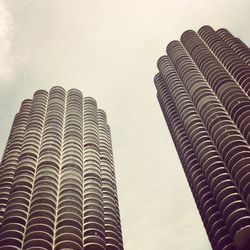 Low angle view of skyscrapers against sky