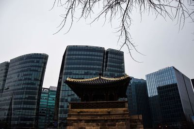 Low angle view of skyscrapers against clear sky