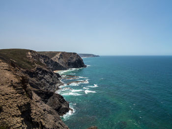 Scenic view of sea against clear sky