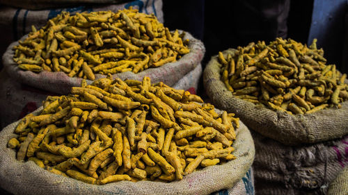 Close-up of turmeric spice for sale in market