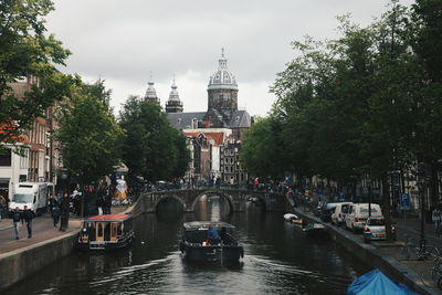 View of bridge over canal in city