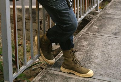 Low section of man standing on floor