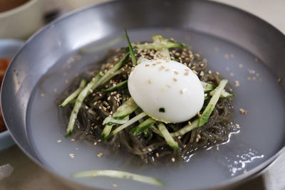 High angle view of eggs in plate