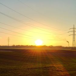 Scenic view of landscape at sunset