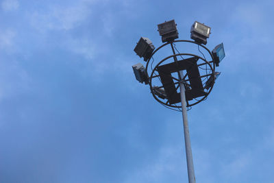 Low angle view of street light against sky