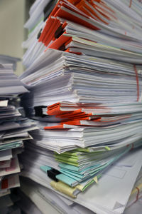Close-up of papers on table