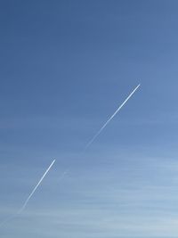 Low angle view of vapor trail in sky