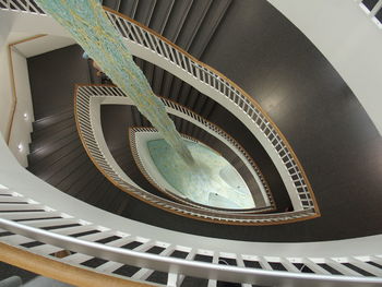 Low angle view of spiral staircase in building