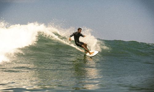 Man surfing in sea