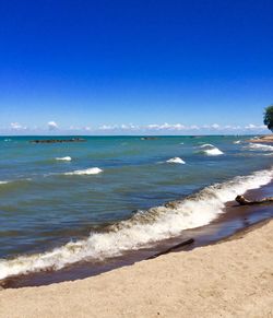 View of sea against blue sky