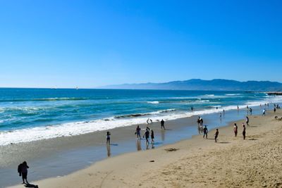 People enjoying at beach